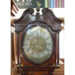 A 19th Century Oak and Mahogany cross banded and inlaid eight day long case clock with unusual oval