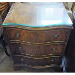 A pair of reproduction Mahogany shaped front bedside chests of three drawers