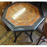 A Victorian octagonal ebonised and Walnut occasional table