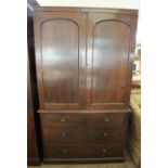 A 19th Century Oak two door over four drawer linen press converted into a wardrobe