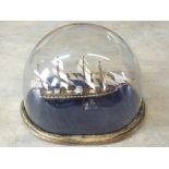 A four masted sail ship under glass dome