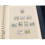 Two albums of mint Guernsey stamps including many blocks