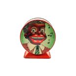 A Chad Valley tin plate ethnic boy money box