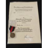 German 1st October 1938 (PATTERN) medal with award document to Unteroffizier Adolf Knodel