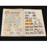 Two keep books of mainly mint world stamps,