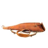 A leather leg of mutton gun case complete with carrying strap