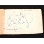 Five autograph books containing a large quantity of well known autographs including John Wayne,