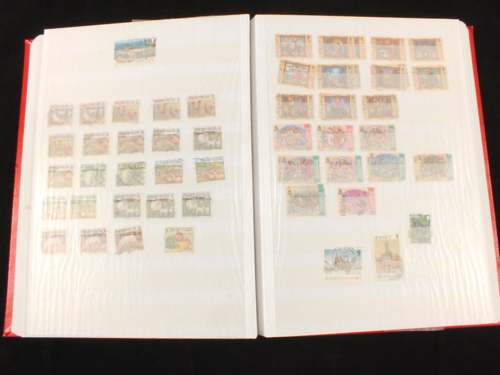 Three stock books of Jersey and Guernsey stamps,