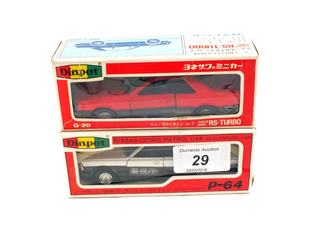 A boxed Diapet RS Turbo and a Nissan Cedric patrol car