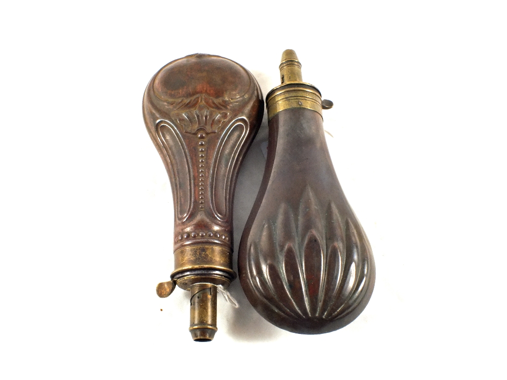 A James Dixon fluted and embossed flask with another