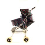 A Silver Cross dolls trolley and cot