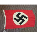 A German WWII (PATTERN) party flag, size 21" x 35" with various stampings to the Lanyard,