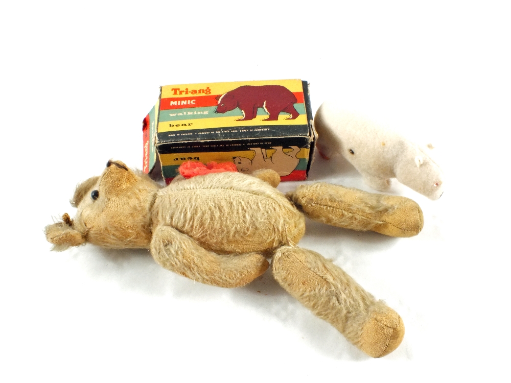 A boxed Triang minic walking bear and a straw filled bear