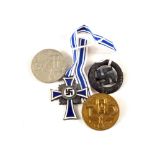 A German WWII (PATTERN) Mothers Cross in silver grade with other German (PATTERN) badges