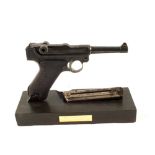 A WWI (dated 1916) 9mm Luger, this fine example has matching numbers (1123) except for magazine,