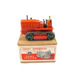 A boxed Dinky 563 heavy tractor with orange body