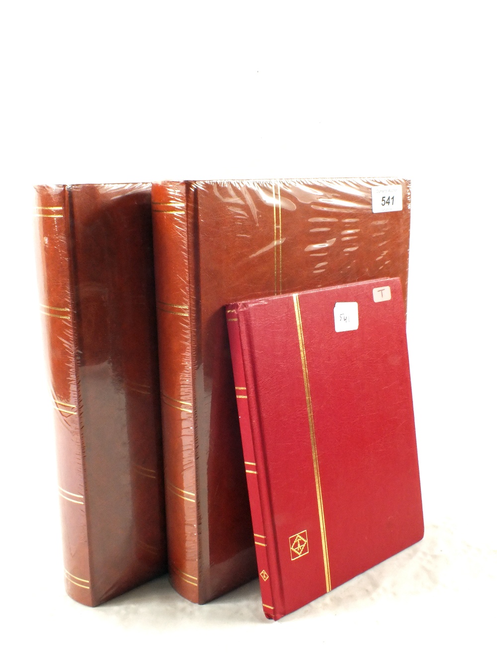 Three unused stock books