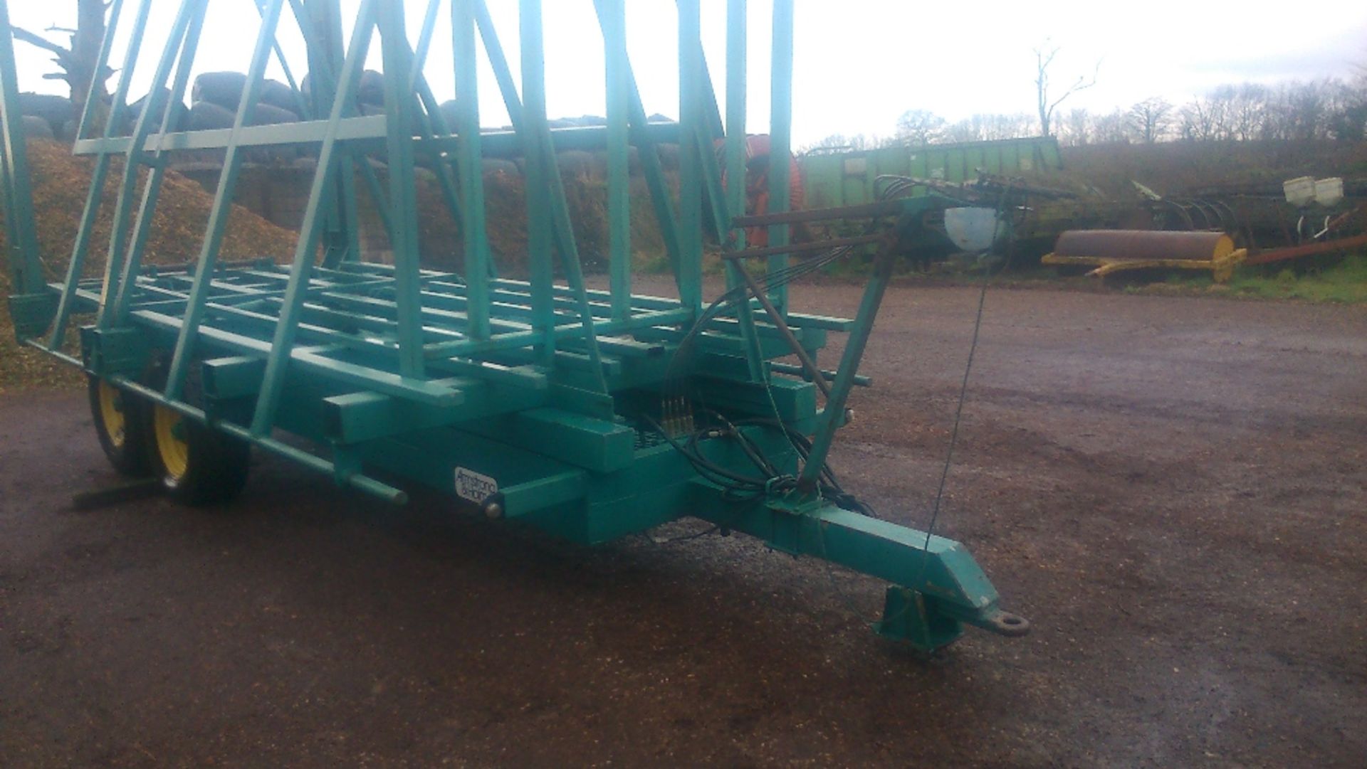 Armstrong and Homes bale accumulator used for midi bales but with inserts to take other sizes.