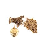 Three 9ct Gold fine chains and a 9ct Gold heart pendant on yellow metal chain