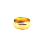 A 22ct Gold wedding band,