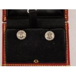 A pair of White Gold Diamond cluster earrings,