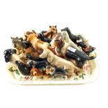 Two Beswick and other dog ornaments