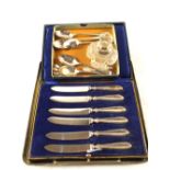 A cased set of six Silver handled tea knives, six Silver spoons,