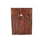 A pair of Nigerian Obi carved wooden panels depicting ceremonial figures,