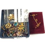 A box of various costume jewellery