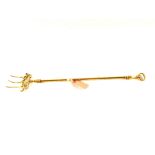 A 19th Century Brass toasting fork with decorative handle and tines,