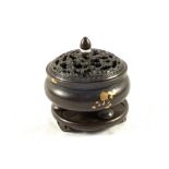A Chinese Bronze Koro on stand with gold splash decoration,