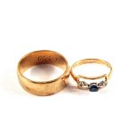 A 9ct Gold Diamond and Sapphire set ring plus a yellow metal wedding band