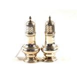 A pair of Silver pepper casters, London 1784, R.