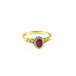 A 9ct Gold red stone and Diamond cluster ring,