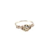 A solitaire Diamond ring approx 1ct set with brilliant cut Diamond setting and baguette cut Diamond