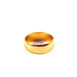 A 22ct Gold wedding band,