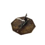 A miniature 18th Century octagonal Brass sundial with engraved decoration and Roman numerals,