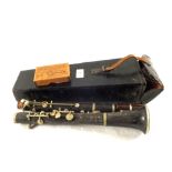 A cased Hawkes & Sons clarinet,