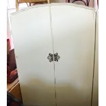 A large modern white double door wardrobe