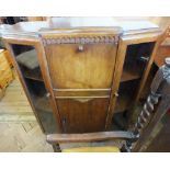 A 1920's Oak bureau cabinet