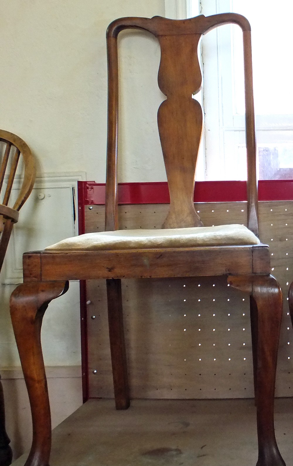 A stripped standard lamp, two Queen Anne style chairs,