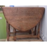 An oval Oak gateleg table
