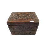 An Eastern carved wooden stationery cabinet with eagle on ball and cloud carved lid