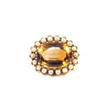 A large Citrine and Pearl brooch mounted in Gold