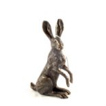 A bronzed figure of a seated Hare,