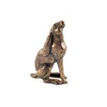 A bronzed figure of a Hare moongazing,