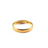 A 22ct Gold wedding band,