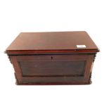 A Mahogany box containing cutthroat razors etc