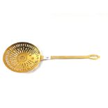 A Victorian Brass cream skimmer,