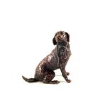 A miniature solid Bronze figure of a Labrador with lead,